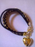 Pulseira preta com dourado